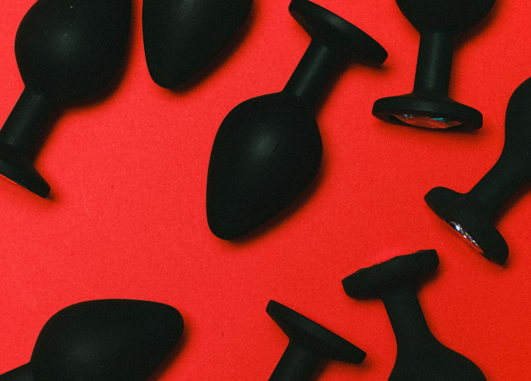 Sex Toys on a Red Background